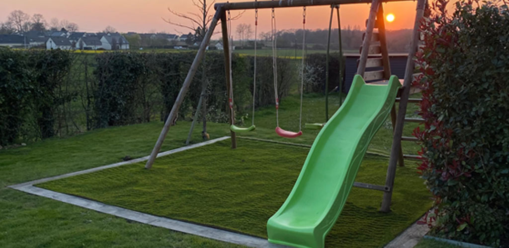 children's slide and artificial grass