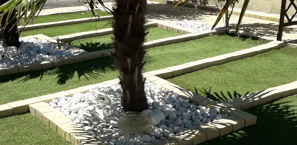 Landscaped garden with artificial grass