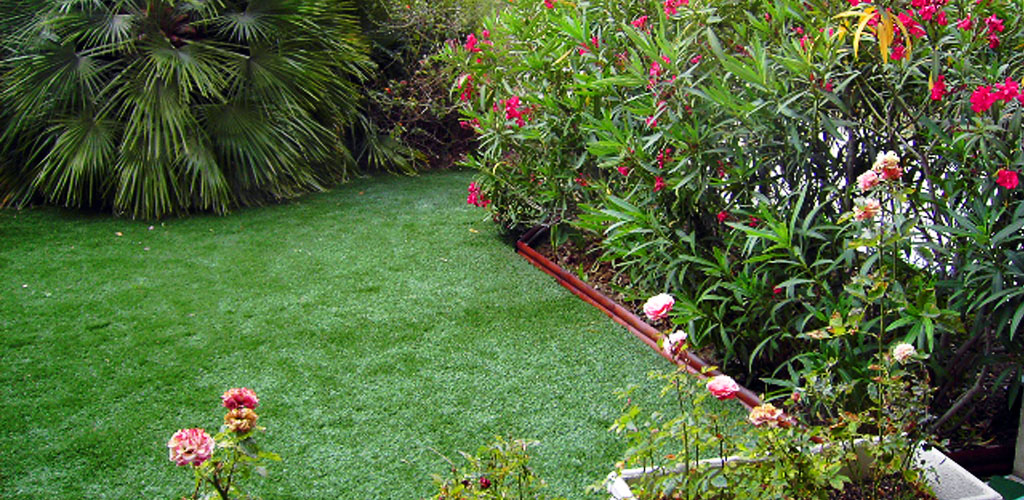 Artificial grass on a small garden