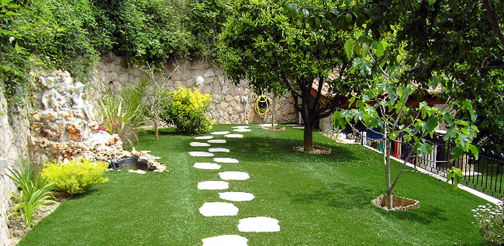 Artificial grass on a nice garden