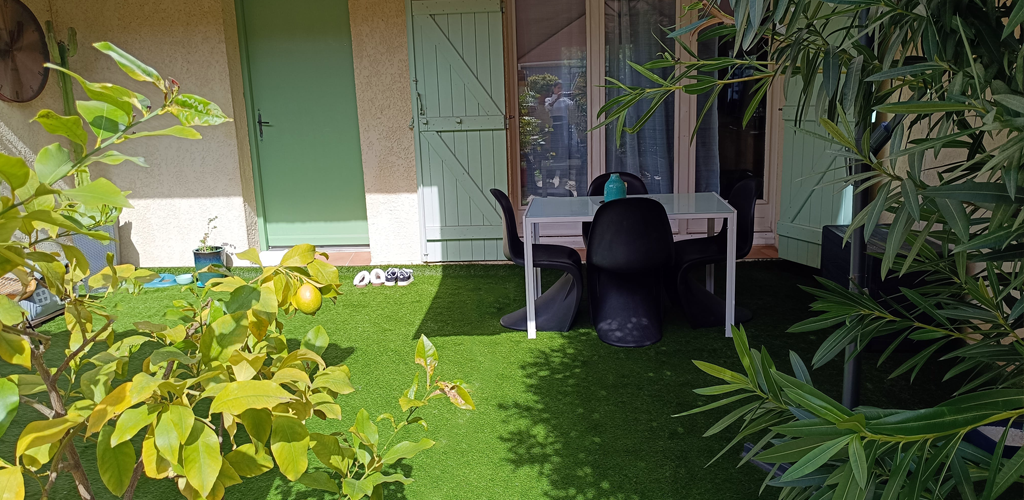 Artificial grass in front of a house