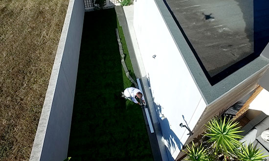 Synthetic grass installer